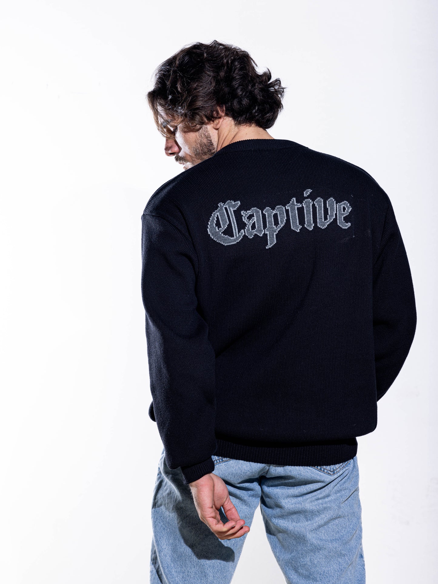 Captive Knit Sweater